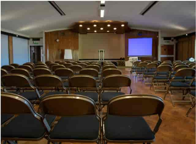 Holborn Library event space with theater seating for corporate seminars and professional meetings.