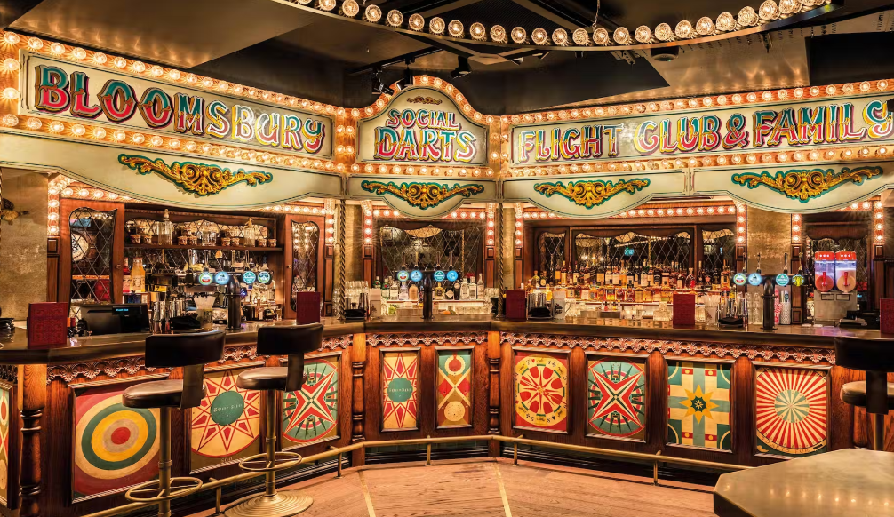 Vibrant bar setup at Flight Club Islington, perfect for events and gatherings. - Banner