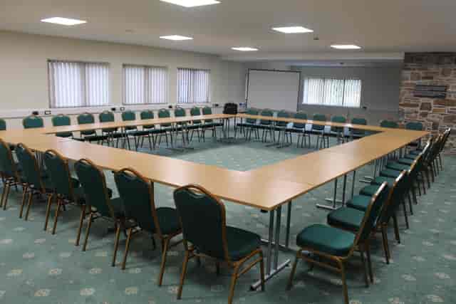 U-shaped meeting room at Royal Welsh Showground, ideal for presentations and discussions.