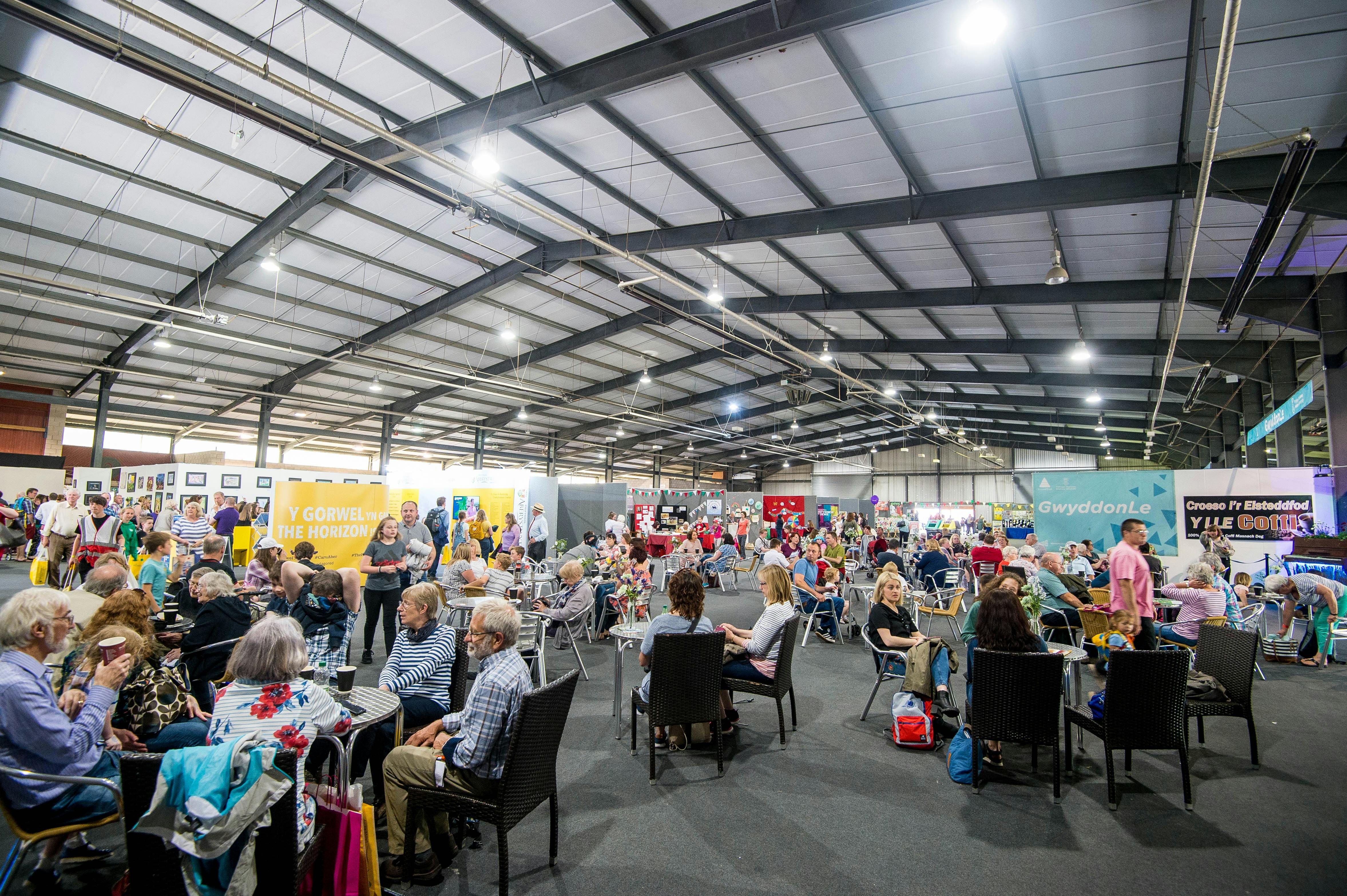 South Glamorgan Hall bustling with attendees at a vibrant exhibition event.