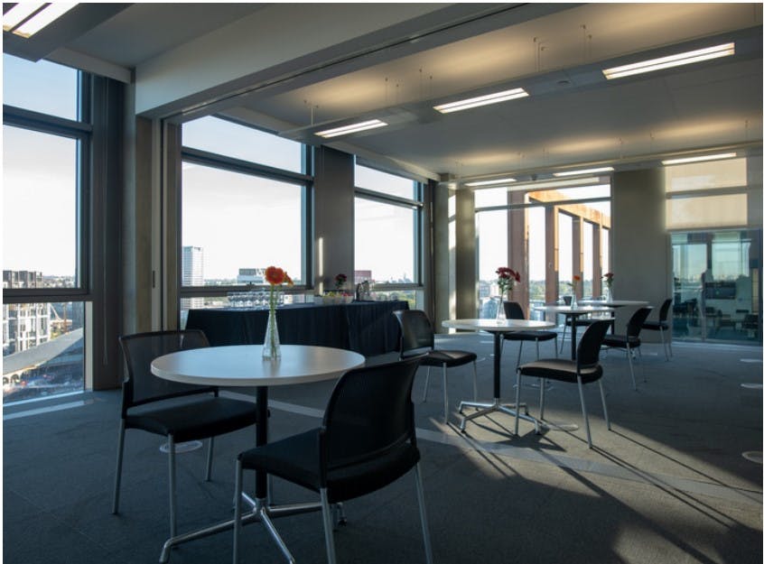 Modern meeting room with large windows, ideal for networking and events at 5 Pancras Square.