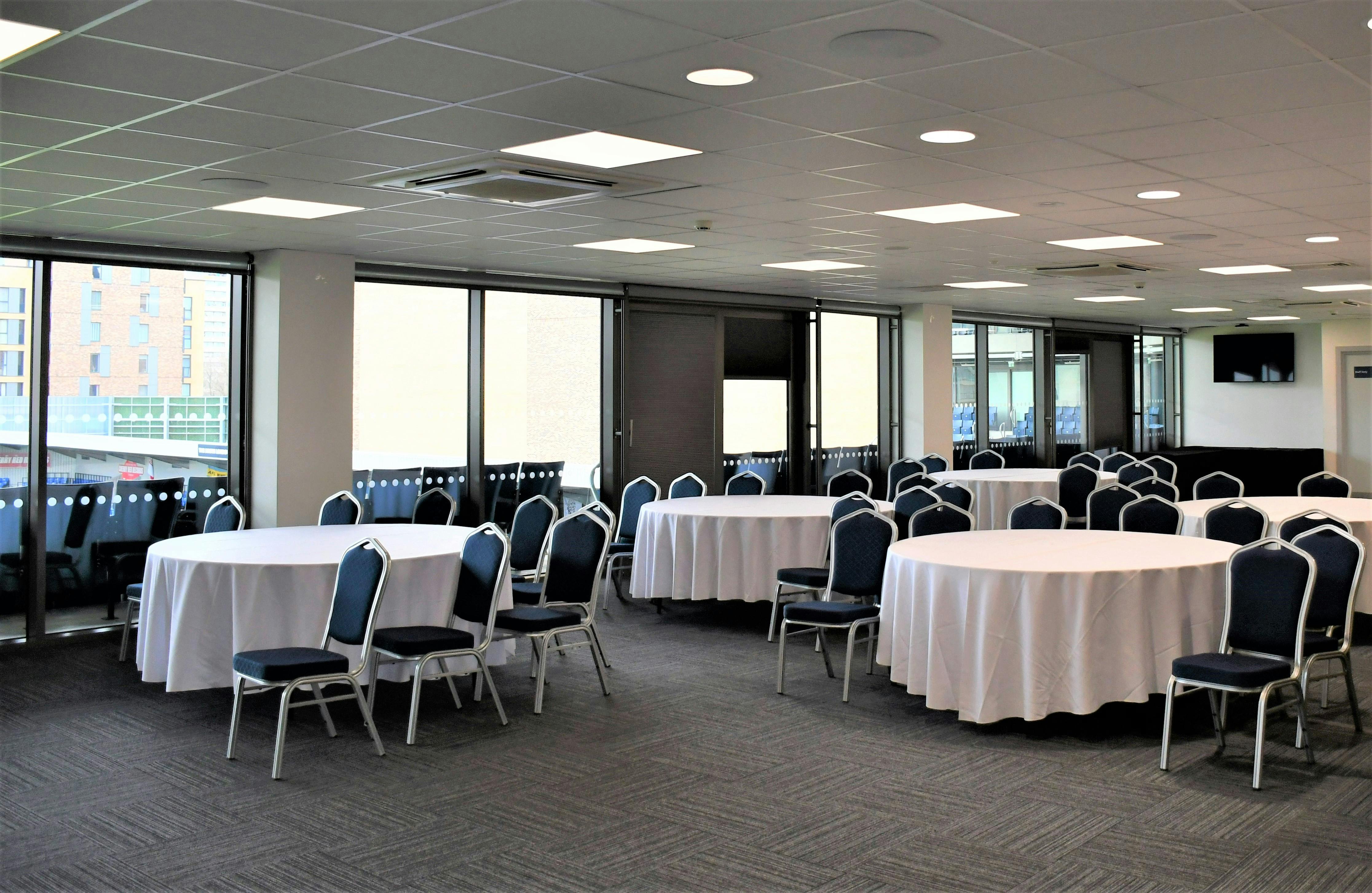 Platinum Lounge at AFC Wimbledon: versatile event space with natural light for conferences and gatherings.