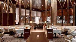 Elegant restaurant interior of The Grace Room, ideal for networking events and private dinners.