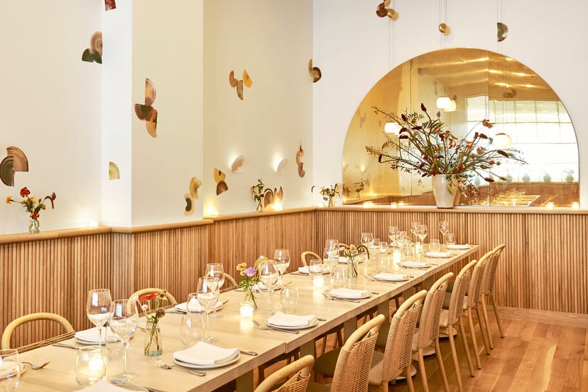 Elegant dining space with floral decor for intimate gatherings and corporate events.
