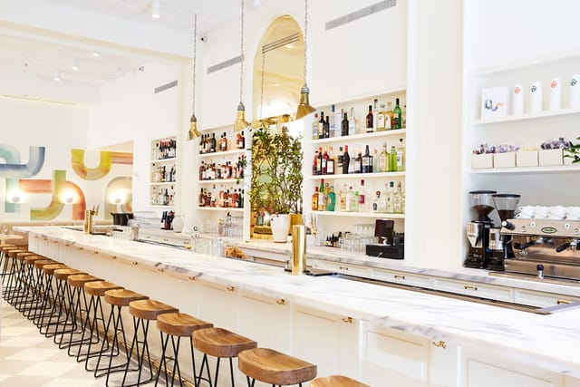 Stylish bar area with marble countertop in Il Fiorista for cocktail receptions.
