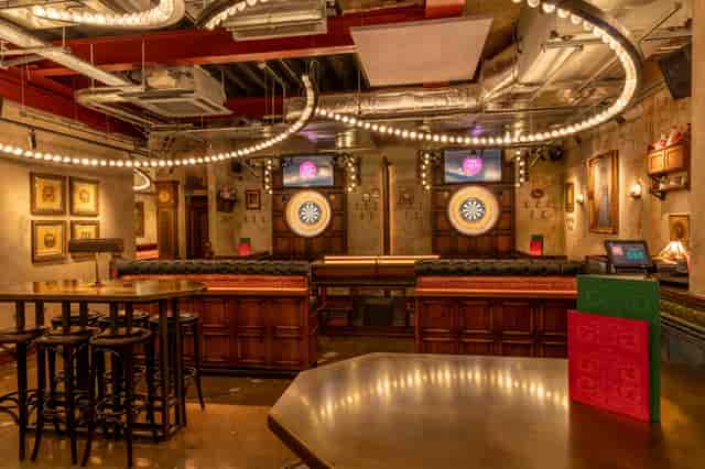 Stylish event space at Flight Club Leeds with dartboards for networking and team-building.