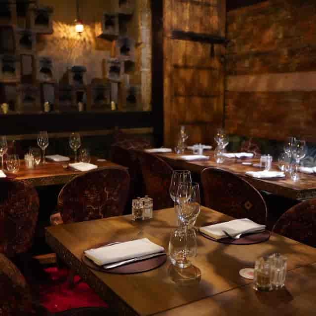 Intimate dining setup in 404 Restaurant for corporate meetings and private events.