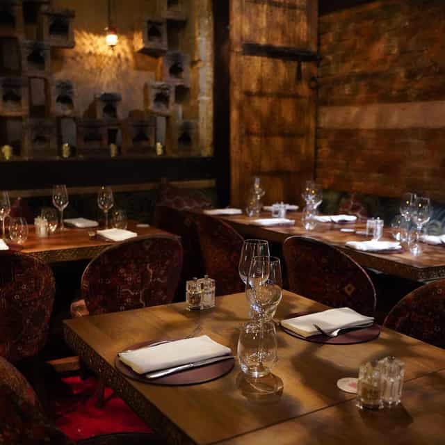 Intimate dining setup in 404 Restaurant for corporate meetings and private events.