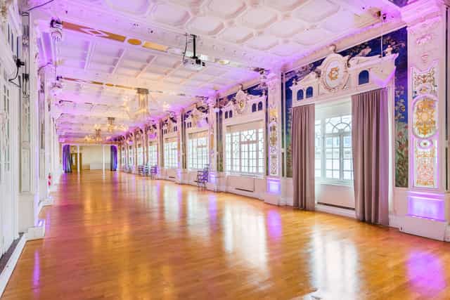 Elegant Salon des Miroirs venue with vibrant murals, perfect for weddings and events.