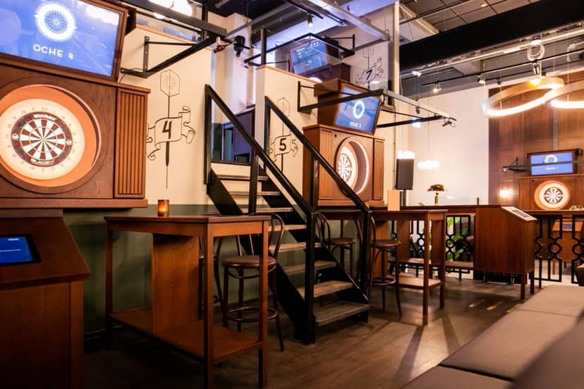 Oche Venue in Amsterdam: vibrant event space with dartboards for team-building activities.