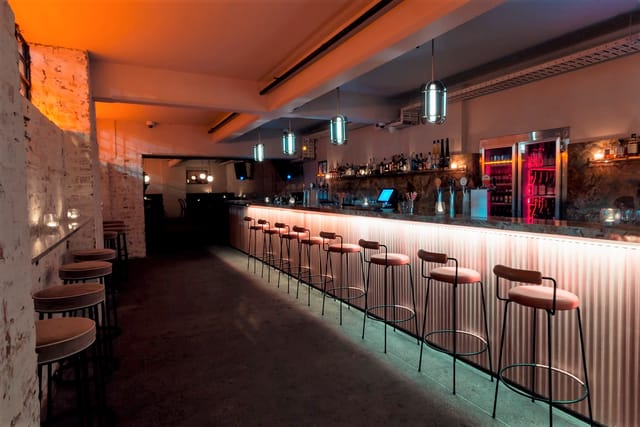 Sleek modern bar venue in Georges, ideal for cocktail receptions and networking events.