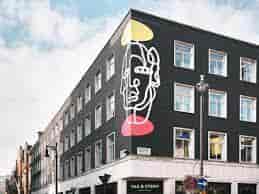 Eccleston Yards venue with bold street art, ideal for creative events and networking.