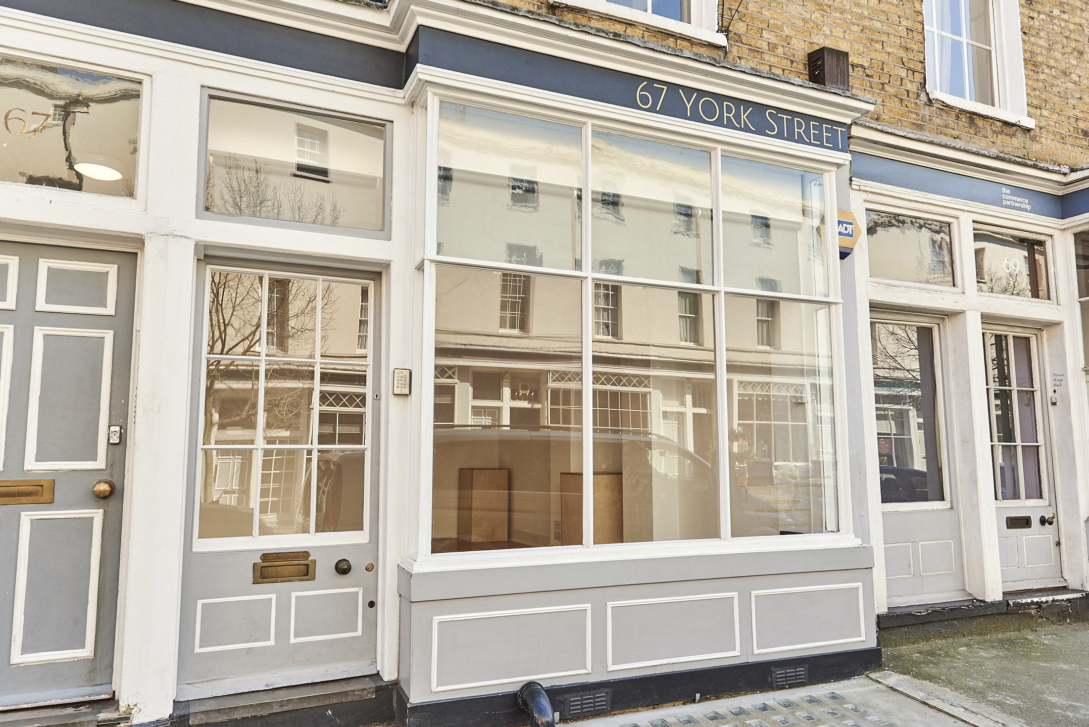 Versatile blank storefront at 67 York Street for pop-up events and meetings. - Banner