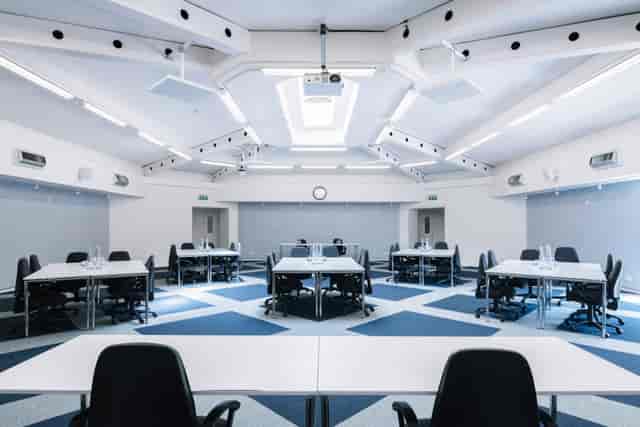 Modern boardroom at Ashridge House with modular workspace for corporate meetings and workshops.