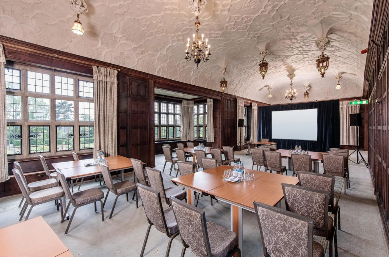 Fanhams Hall meeting room with classic architecture, ideal for corporate events and workshops.
