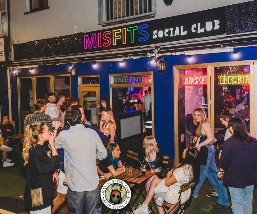 Vibrant outdoor social gathering at Misfits Social Club, ideal for networking events.