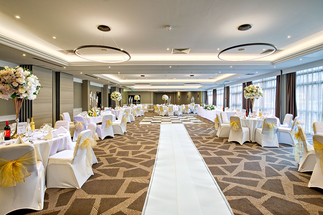 Springfield Suite at DoubleTree Ealing, elegant wedding venue with floral decor and natural light.