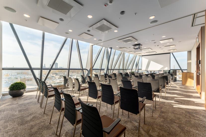 Modern meeting room with panoramic view at AC Hotel Riga, ideal for conferences and workshops.