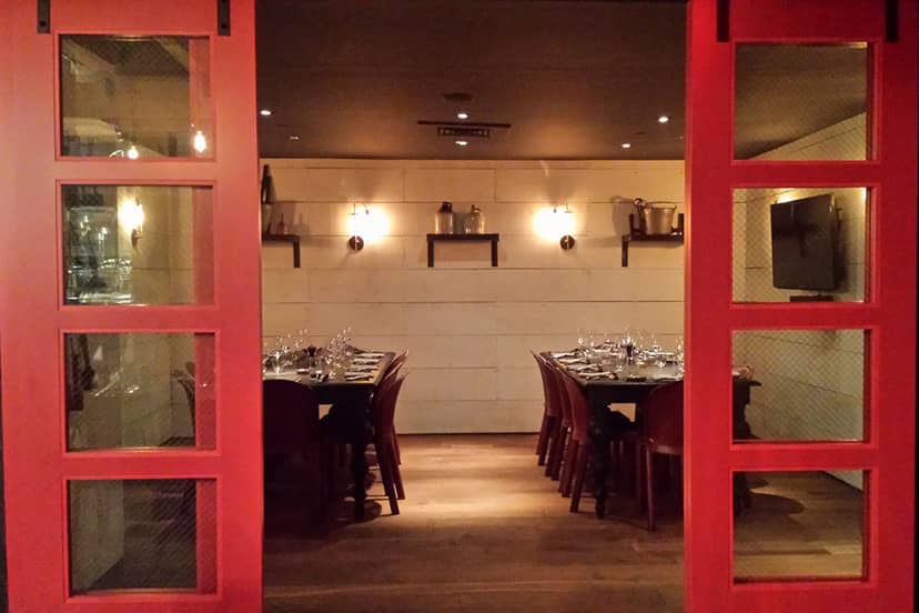 Intimate dining space at The Shed, featuring elegant decor for private events.