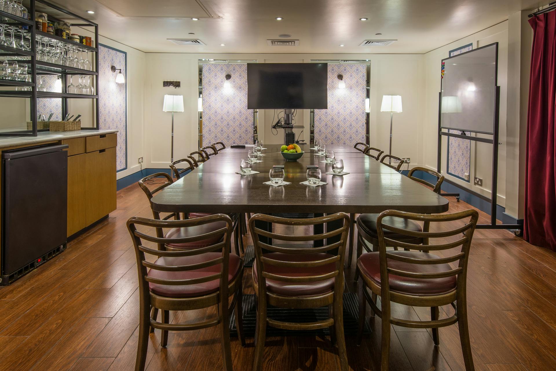 Intimate meeting room in Cote Brasserie St. Paul's, perfect for board meetings and conferences.