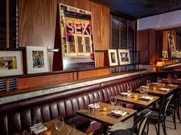 Private dining room at Smyths Tavern with plush seating, ideal for intimate events.