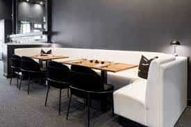 Modern Kimono Room with curved banquette, ideal for networking events and private dinners.