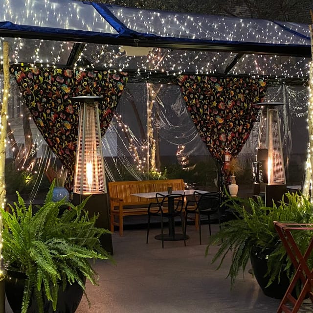 Private dining room with elegant drapery, perfect for outdoor events and intimate dinners.
