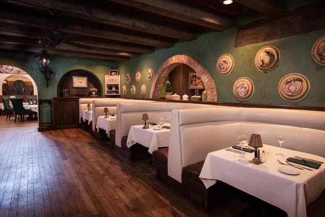 JC Bruno Restaurant Library Room: cozy booth seating for VIP dinners and networking events.