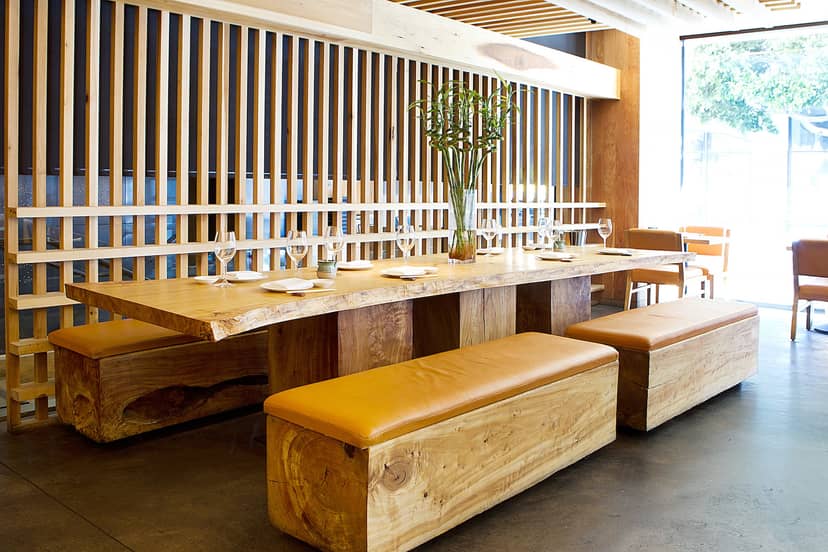 Private dining room at Roka Akor with natural wood decor, ideal for intimate events.