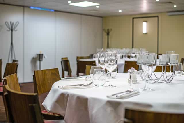 Elegant dining area in Provence room, perfect for corporate dinners and events.