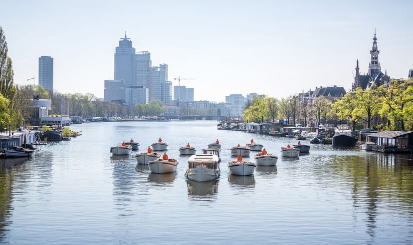 "Amsterdam boat experience with scenic waterfront for outdoor events and networking."