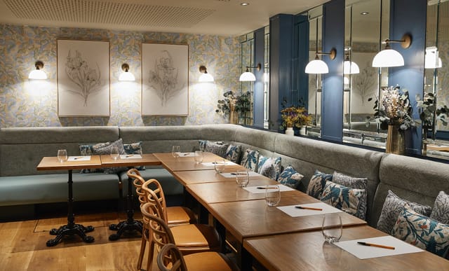 Private meeting room at Cote Brasserie, elegant decor for workshops and team meetings.