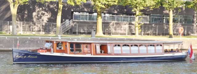 Elegant boat venue for corporate events and private celebrations on water.