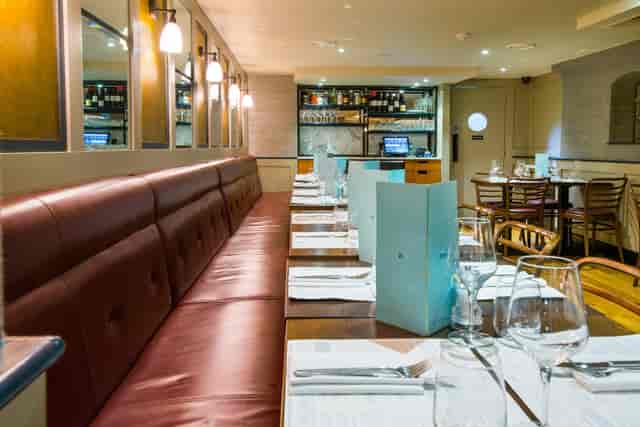 Private dining room at Cote Brasserie, elegant setting for intimate gatherings and corporate events.