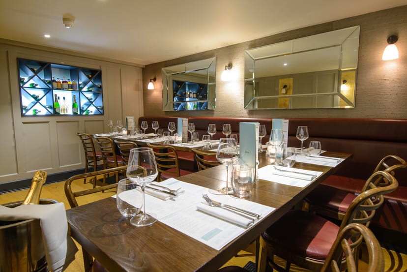 Private dining space at Cote Brasserie, elegant table setting for upscale events.