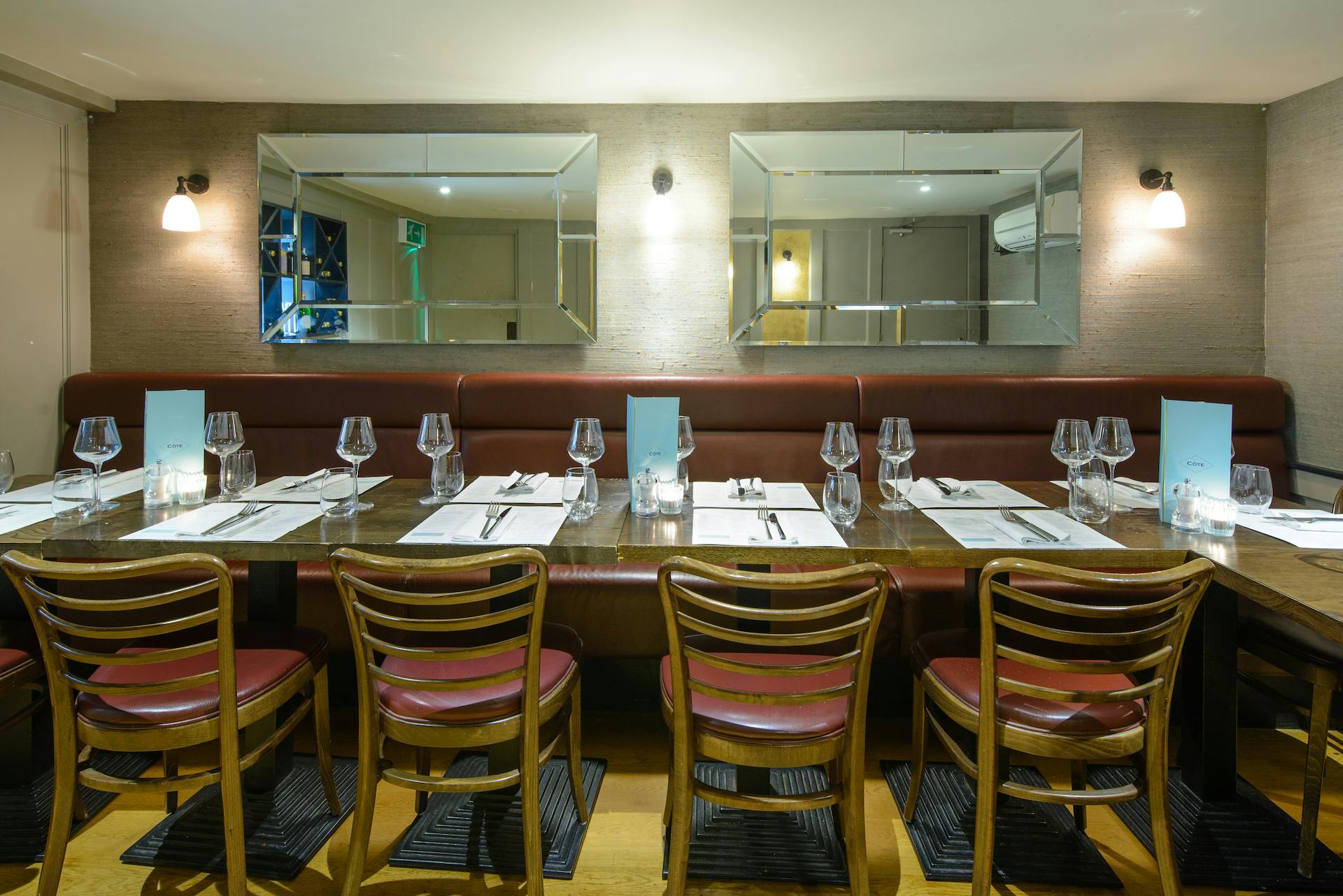 Private dining space at Cote Brasserie, elegant table setting for corporate events.