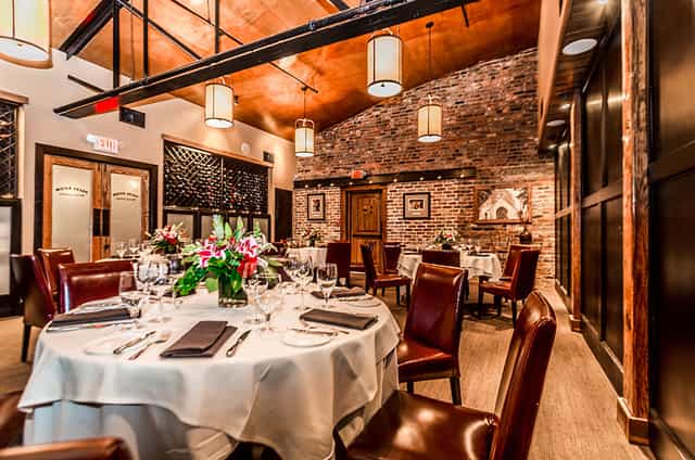 Elegant dining space in The Wine Room, perfect for upscale events and gatherings.