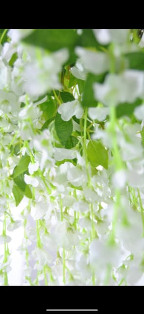 Elegant white floral decorations for weddings and corporate events at EVE Studio.