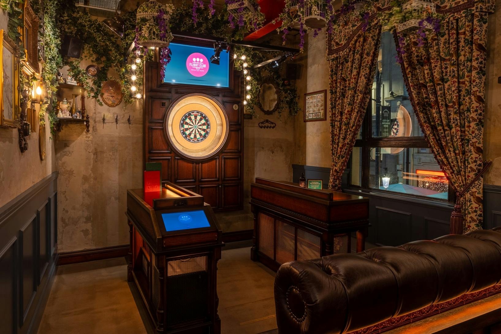 Mr Fox in Flight Club Cardiff, stylish dartboard venue for casual networking events.