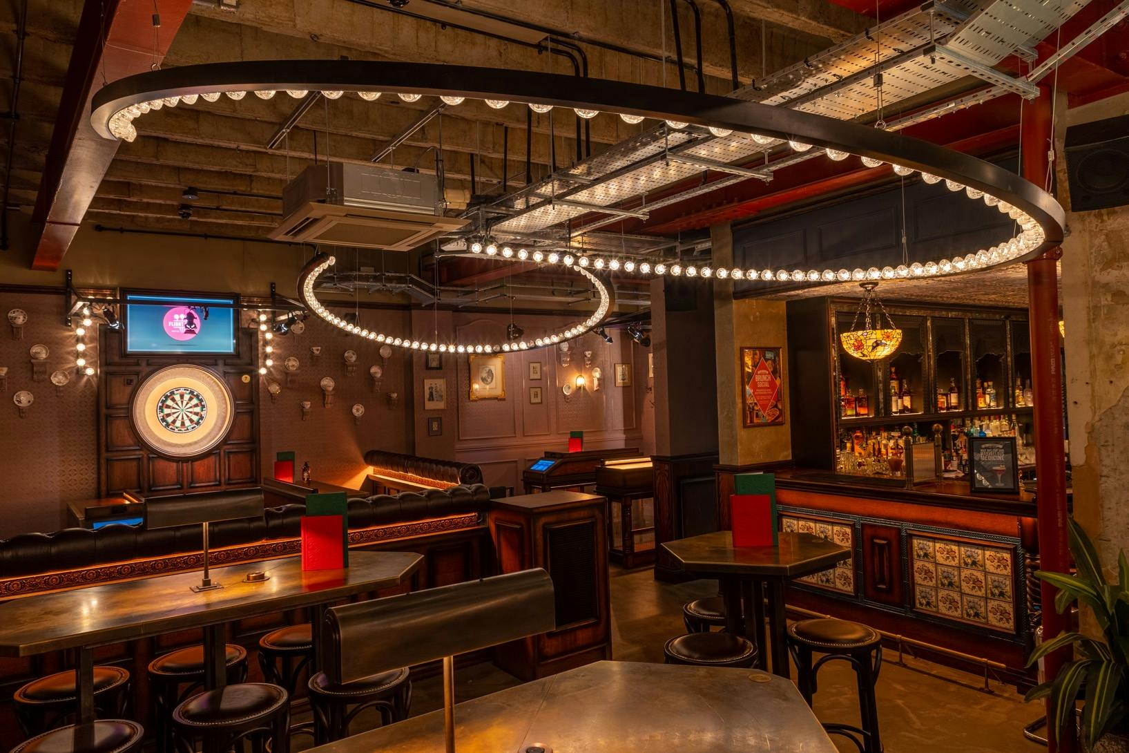 Stylish event space with modern lighting at Flight Club Cardiff for networking and gatherings.
