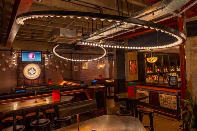 Stylish event space with modern lighting at Flight Club Cardiff for networking and gatherings.