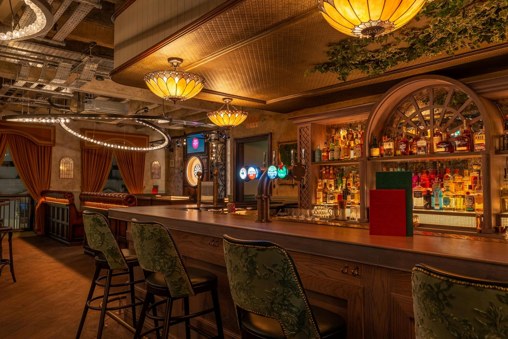 Stylish bar at Flight Club Cardiff, ideal for networking events and gatherings.