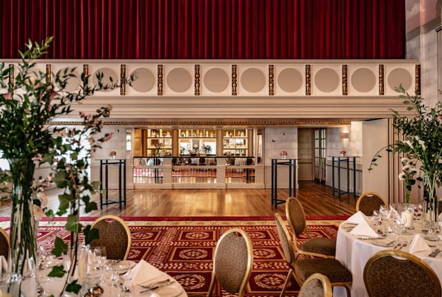 Bloomsbury Queen Mary Hall, red drapes, elegant banquet, gala venue