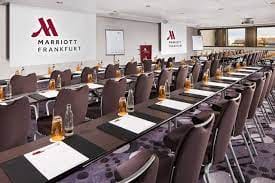 Meeting room at Frankfurt Marriott Hotel, ready for conferences with natural light.