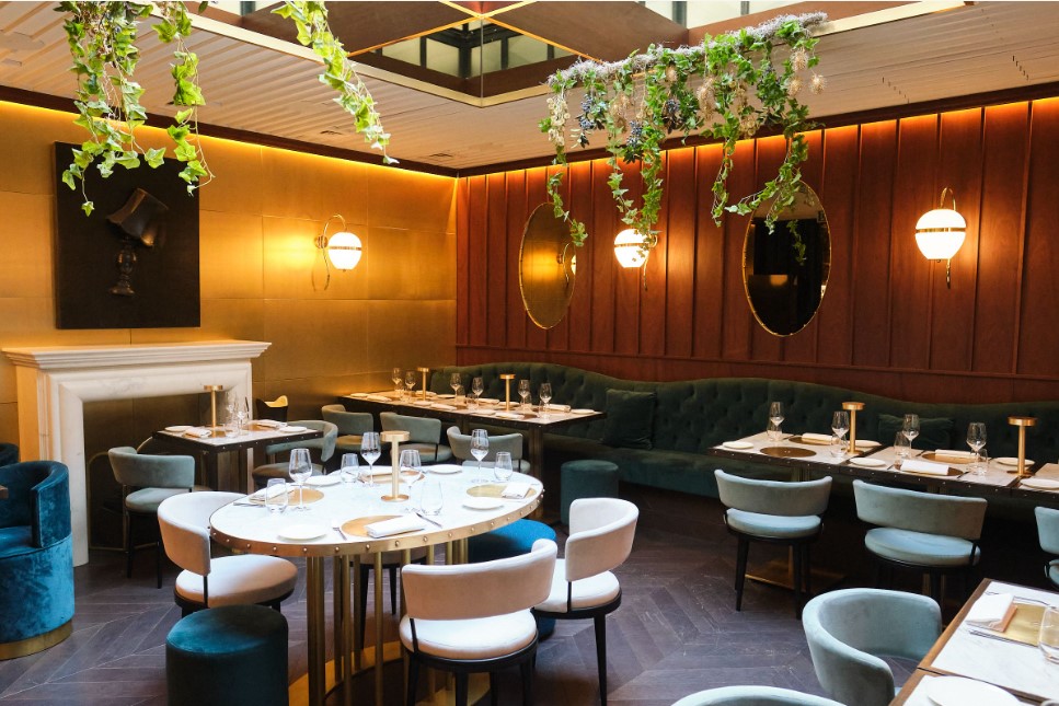 Stylish restaurant in The Distillery London, ideal for corporate events and gatherings. - Banner