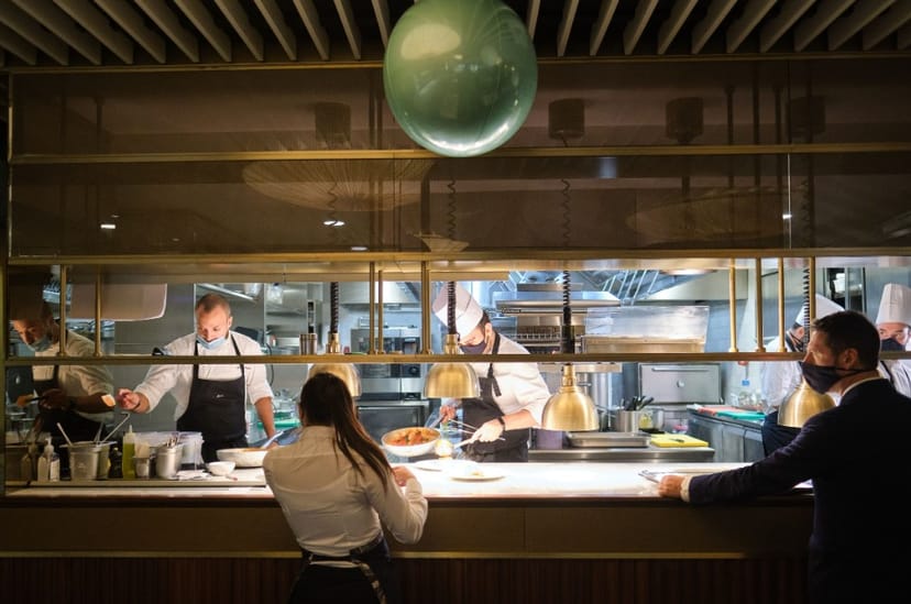 "IT London Space kitchen, chefs collaborating for upscale culinary events in The Distillery."