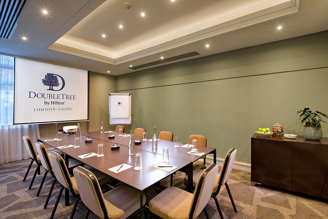 Townshend Suite meeting room with large table, ideal for corporate events and workshops.