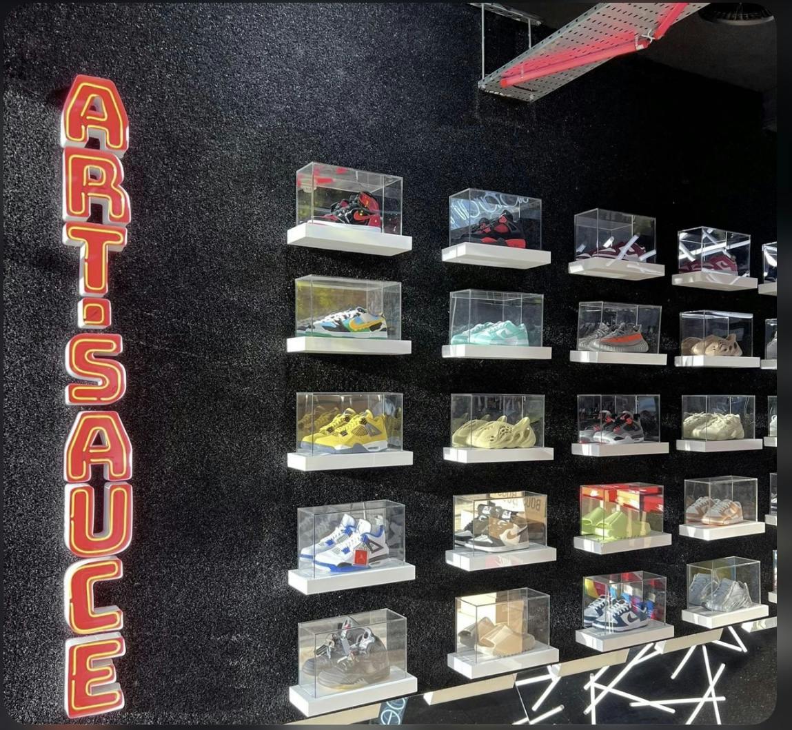 Vibrant sneaker display in clear cases for product launches and fashion events.