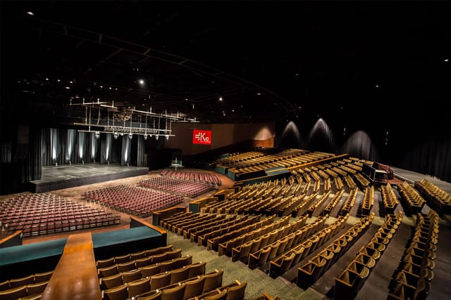 Ashe Auditorium with tiered seating, ideal for conferences and concerts.