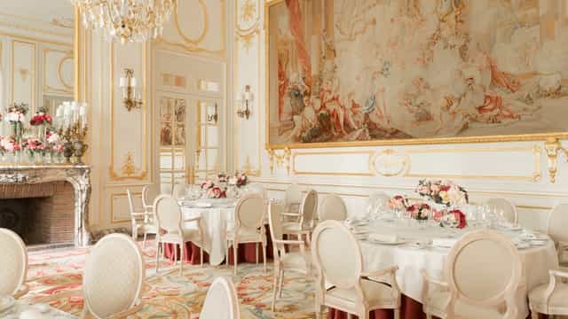 Elegant Salon Cambon at Ritz Paris, featuring round tables for weddings and galas.